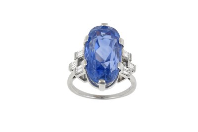 Lot 2109 - A Platinum Sapphire and Diamond Ring the oval...