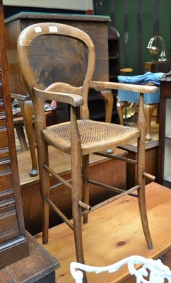 Lot 750 - Child's stained beech high chair