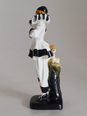 Lot 571 - A Royal Doulton Figure The Mask, HN657,...