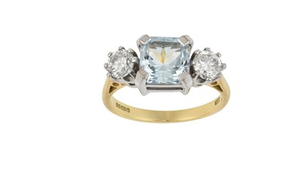 Lot 2336 - An 18 Carat Gold Blue Topaz and Diamond Three...