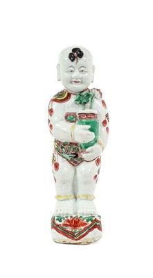 Lot 78 - A Chinese Porcelain Figure of a Boy, Kangxi,...