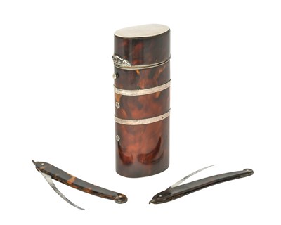 Lot 2124 - A French Silver-Mounted Tortoiseshell Case With Two George III or George IV Razors