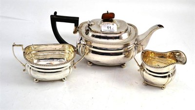 Lot 11 - A silver three piece tea service, by C.S.Harris & Sons Ltd, London 1920