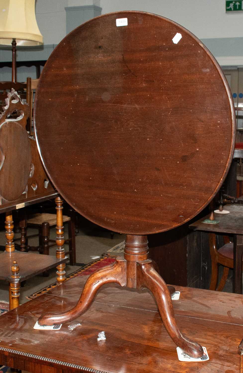 Lot 1409 - A George III Mahogany Dish Top Tripod Table