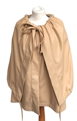 Lot 1017 - Celine Faux Leather Capelet comprising a...