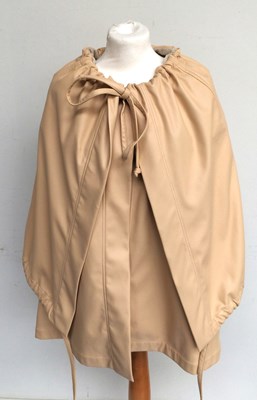 Lot 1017 - Celine Faux Leather Capelet comprising a...