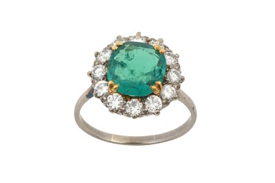 Lot 2317 - An Emerald and Diamond Cluster Ring the...
