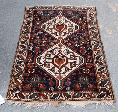 Lot 1008 - Khamseh Rug, the midnight blue field with...