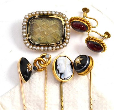 Lot 53 - A mourning brooch (a.f.), four stick pins and a pair of earrings