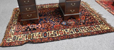 Lot 1099 - Kashgai Rug, the abrashed crimson field of...