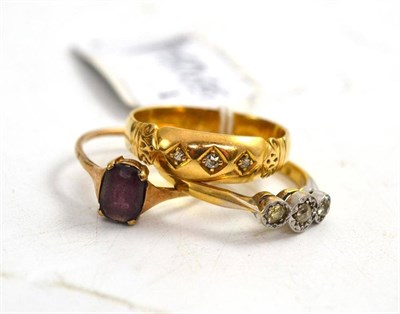 Lot 58 - Three stone ring, gold ring with rose diamonds and a ring set with amethyst