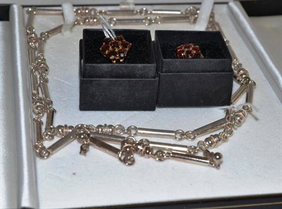 Lot 60 - Two 9ct gold garnet cluster rings and silver bar link necklace with matching earrings