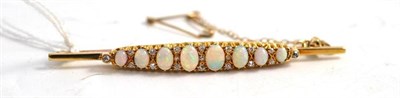 Lot 73 - Gold and opal brooch