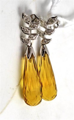 Lot 79 - A pair of citrine and diamond drop earrings, a leaf motif stud set with five round brilliant...