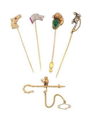 Lot 2416 - Four Stick Pins and A Brooch the stick pins...