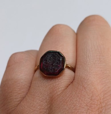 Lot 2029 - A Garnet Intaglio Ring