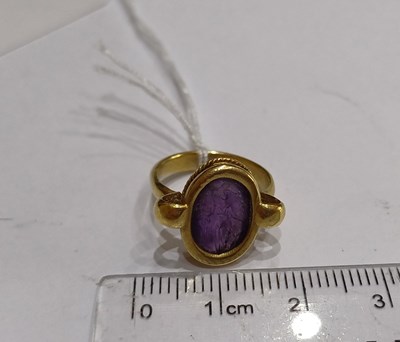 Lot 2012 - An Amethyst Intaglio Ring