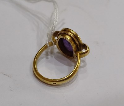 Lot 2012 - An Amethyst Intaglio Ring