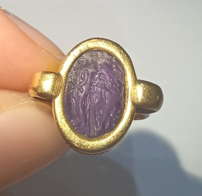 Lot 2012 - An Amethyst Intaglio Ring