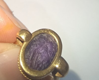 Lot 2012 - An Amethyst Intaglio Ring