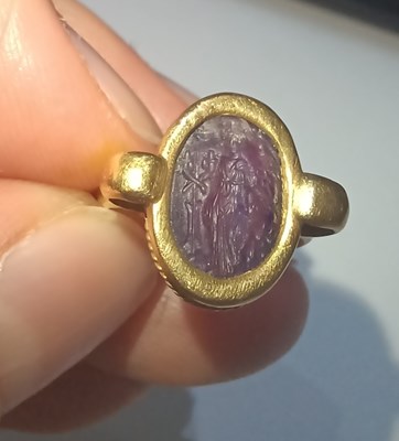 Lot 2012 - An Amethyst Intaglio Ring