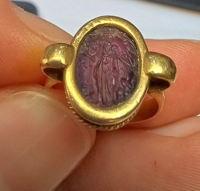 Lot 2012 - An Amethyst Intaglio Ring