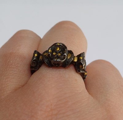 Lot 2032 - A Parcel Gilt Cut Steel Ring