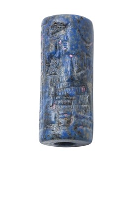 Lot 2002 - A Mesopotamian Lapis Lazuli Cylinder Seal