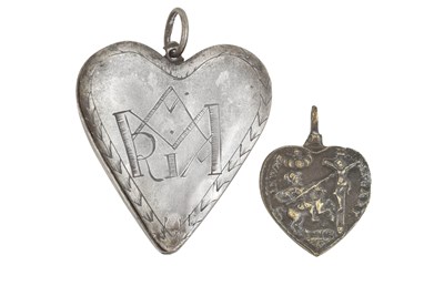 Lot 2098 - A Continental Silvered Reliquary and a Continental Brass Pendant