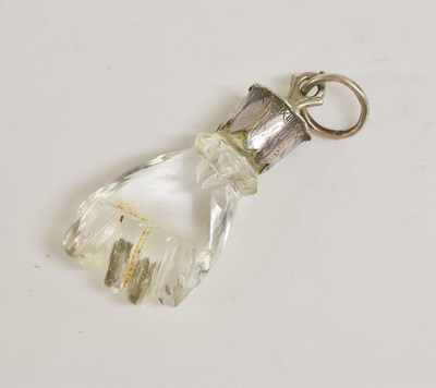 Lot 2016 - A Silver-Mounted Rock Crystal Amulet or Pendant
