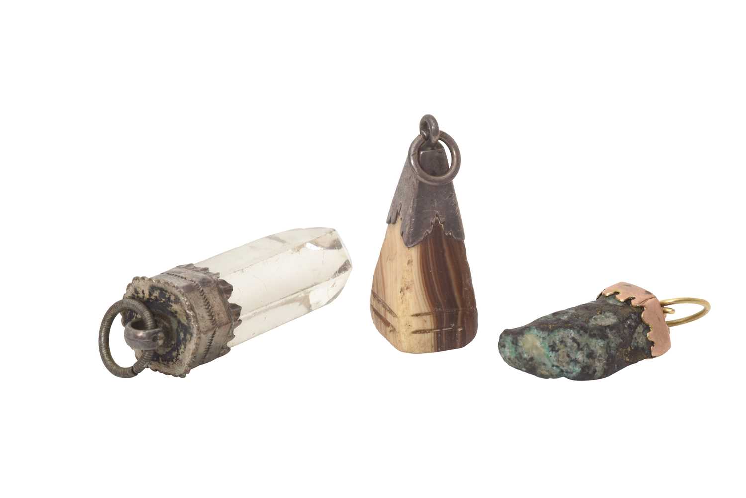 Lot 2014 - A Group of Mounted Hardstone Amulets