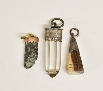 Lot 2014 - A Group of Mounted Hardstone Amulets