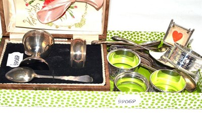 Lot 91 - A quantity of silver teaspoons, cased Christening set comprising egg cup, napkin ring and...