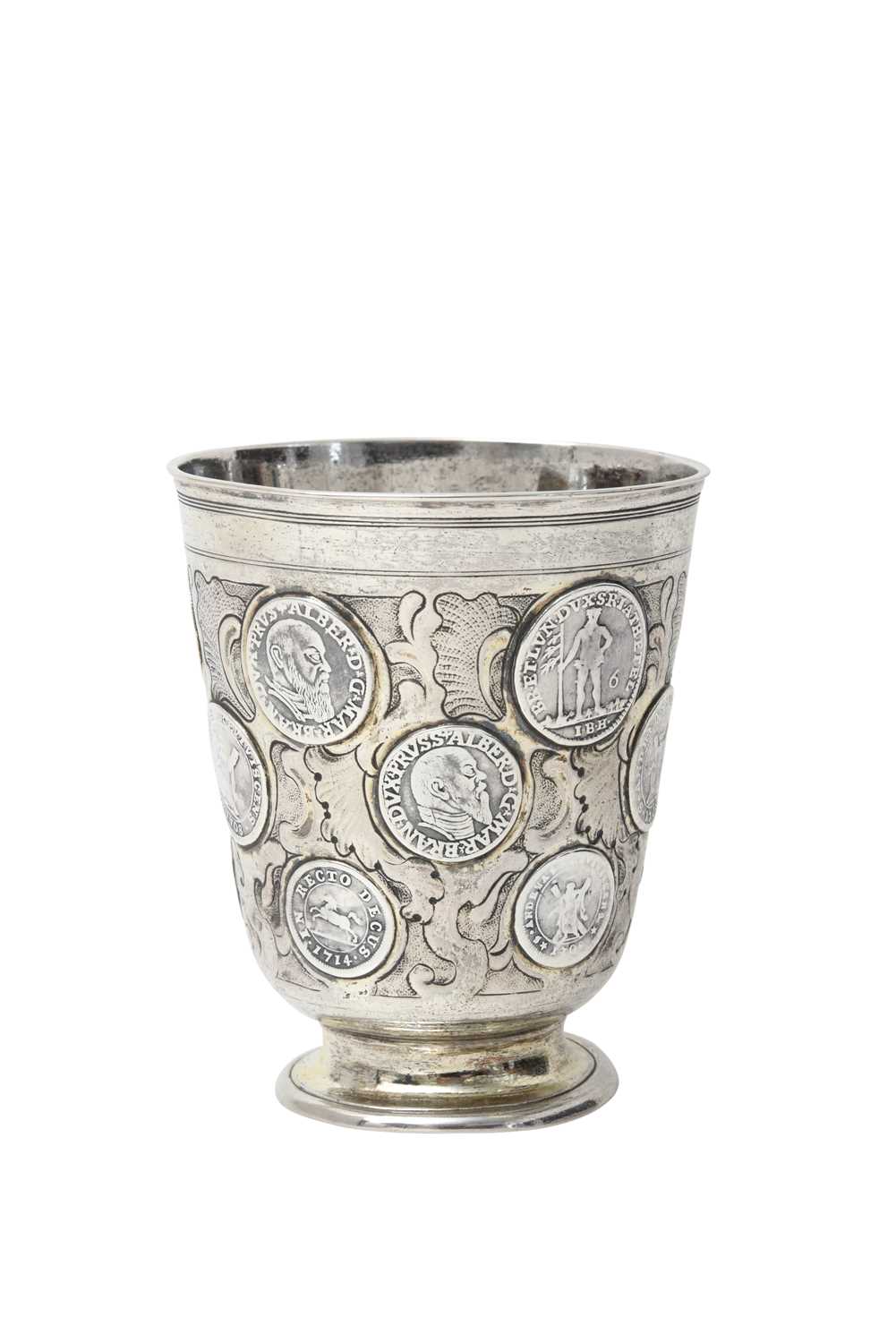 Lot 2056 - A German Parcel-Gilt Silver Coin-Set Beaker (Munzbecher)