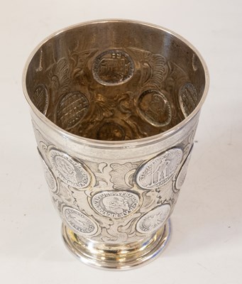 Lot 2056 - A German Parcel-Gilt Silver Coin-Set Beaker (Munzbecher)
