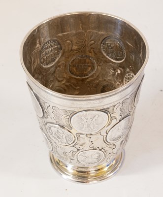 Lot 2056 - A German Parcel-Gilt Silver Coin-Set Beaker (Munzbecher)