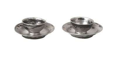 Lot 2142 - A Pair of Dutch Silver Miniature Toy Tea-Bowls and Saucers