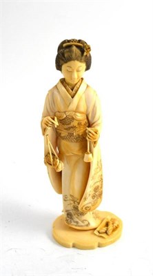 Lot 99 - A Japanese ivory figure of a lady (a.f.)