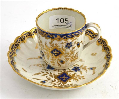 Lot 105 - A Caughley blue and gilt cup and saucer