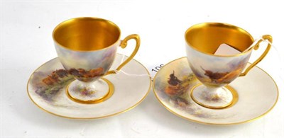 Lot 106 - A pair of Royal Worcester cabinet cups and saucers, painted by Harry Stinton with highland cattle