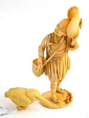 Lot 108 - A Japanese elephant figure of a fisherman and a Japanese ivory kingfisher (2) (a.f.)