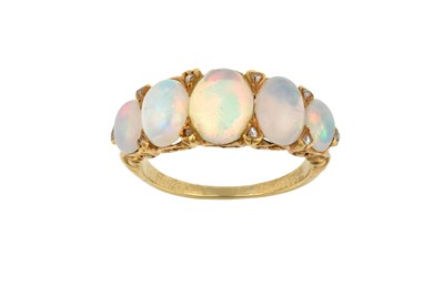 Lot 2468 - An Opal Ring five graduated oval cabochon...