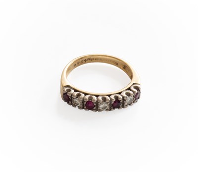 Lot 286 - An 18 Carat Gold Ruby and Diamond Half Hoop...