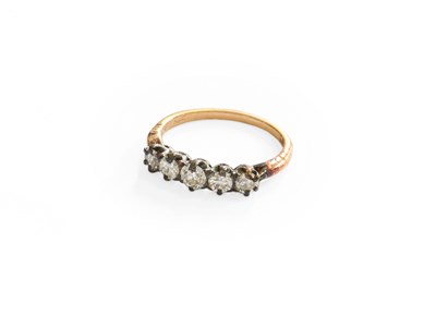 Lot 258 - A Diamond Five Stone Ring, the central old cut...