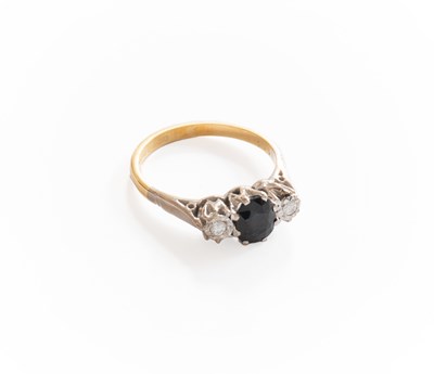 Lot 289 - An 18 Carat Gold Sapphire and Diamond Three...