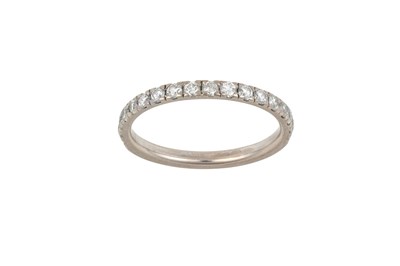 Lot 2402 - An 18 Carat Gold Diamond Half Hoop Ring the...