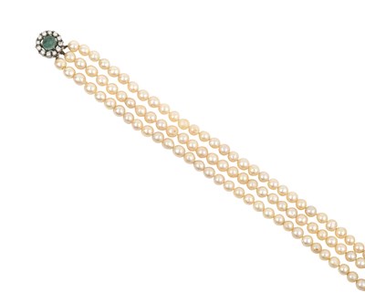 Lot 2399 - A Triple Row Cultured Pearl Necklace, with An...