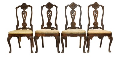 Lot 501 - A Set of Four Carved Walnut Dining Chairs, in...