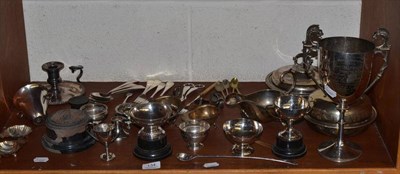 Lot 134 - A collection of silver and silver plate including a trophy cup, sauce boats, chambersticks, etc