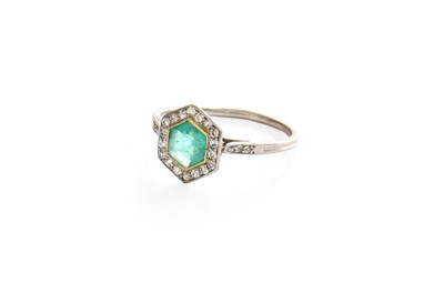 Lot 280 - An Emerald and Diamond Cluster Ring, the...